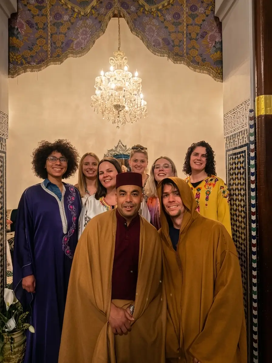 Guide Hasy with Tourists in Traditional Moroccan Dress at Riad